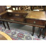 A George IV mahogany piano case with applied gilt metal mounts turned and fluted legs with makers