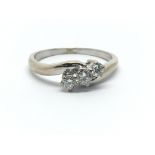An 18ct white gold three diamond ring, approx 0.33ct, ring size Q/R