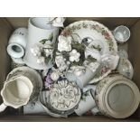 A box containing decorative ceramics including a porcelain Royal Staffordshire flower vase and