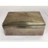 A silver cigar box, London hallmarks.