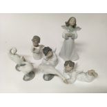 6 Lladro porcelain cherub and geese figurines.