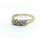 An 18ct yellow gold and three stone diamond ring, approx 0.5ct, ring size approx K/L