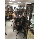 A 20th century mahogany bird Cage in the form of an Indian temple. 71cm x 71cm x 198cm.