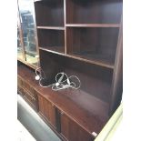 A Modern design Danish made Rosewood display and bookcase unit in three sections with open shelves