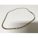 An 14 carat Italian gold necklace with closed flat