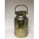 A brass milk churn numbered 14 with a locking lid. Height 50cm.