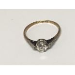 An 18carat gold and platinum ring set with a solitaire diamond approximately0.55 of a carat ring