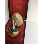 A Stuart Devlin silver gilt limited edition egg Ra