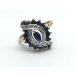 A 9ct sapphire and diamond ring, ring size approx K/L