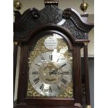 A Quality reproduction mahogany long case clock , the brass dial with Roman numerals With weights
