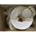 A Thomas German modern design white porcelain dinner service with applied gilt.( In two boxes) -