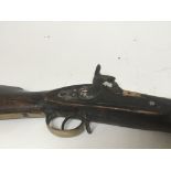 A Percussion Rifle with a walnut stock and brass fittings