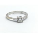 An 18ct white gold and princess cut diamond, approx 0.25ct, ring size approx N/O