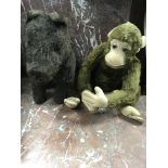 A Parnell toy brown plush monkey and a Scottie dog .