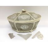 An Ivory Canton box and cover with pagoda and floral decoration, approx width 26cm, some damage.