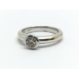 An 18ct white gold and diamond solitaire ring, approx 0.33ct, ring size approx G/H