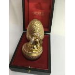 A Stuart Devlin limited edition silver gilt egg, B