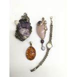 A sterling silver and marcasite set ladies watch, 2 silver and stone set pendants plus a large white