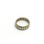 A 9ct gold ring set with two rows of diamond chips, approx 4g and approx size M-N.