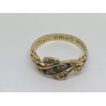 An antique 18ct gold, sapphire and pearl ring, approx 3g and approx size P.