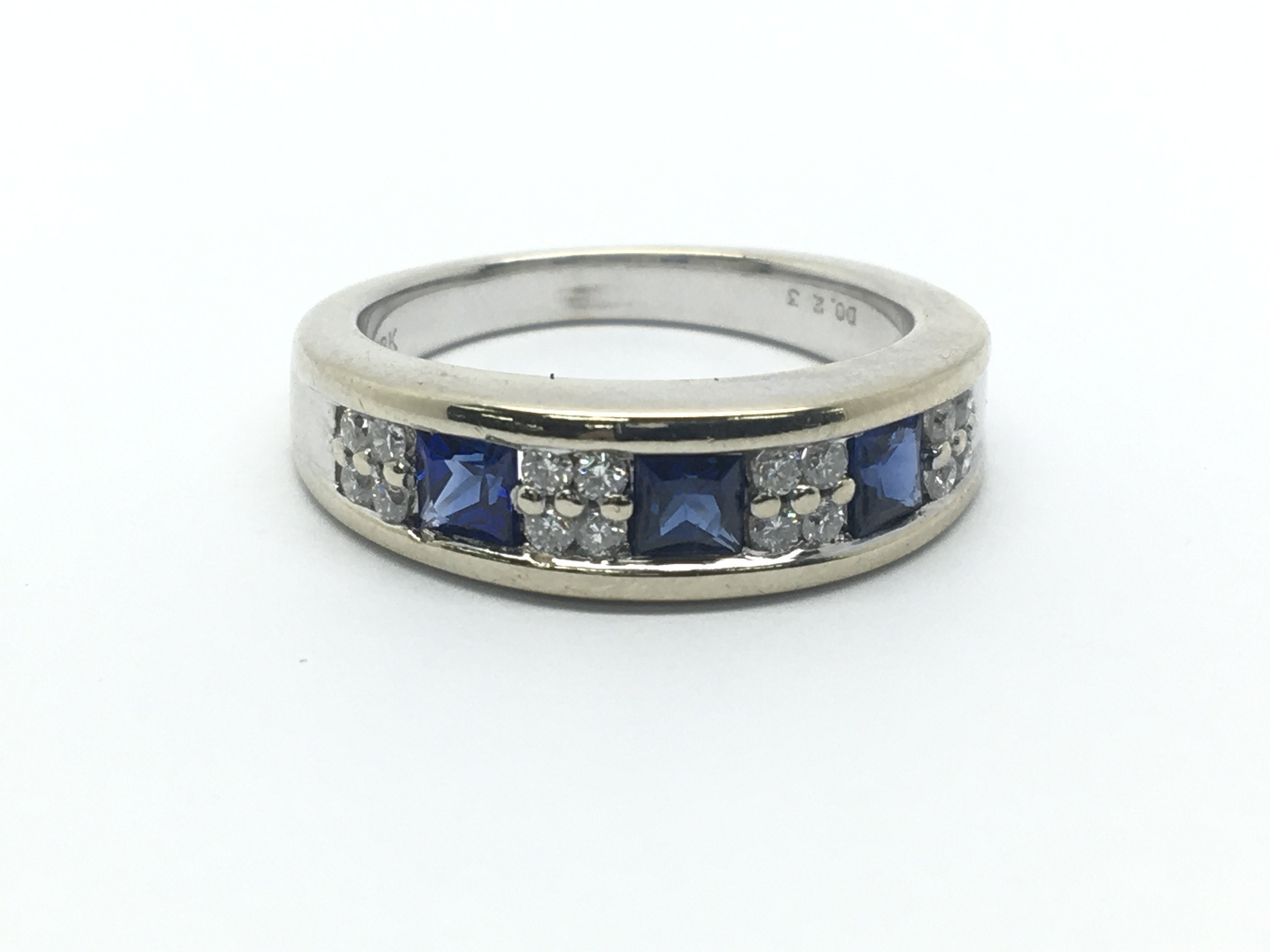 An 18ct white gold, diamond and sapphire ring, diamonds approx 0.23ct, ring size approx L/M