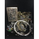 A box containing jewellery items including silver examples, a Pandora ring etc.