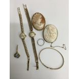 2 9ct gold ladies watches, a 9ct gold stone set pendant, 9ct gold bangle, a 9ct gold mounted