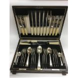 An oak cased canteen of cutlery.