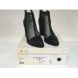 A pair of designer ladies leather and mesh ankle boots maker Solsana unworn with box. Size 40.