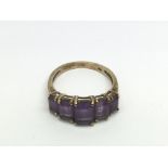 Another 9ct gold ring set with amethyst coloured stones, approx 2.6g and approx size M-N.