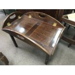 A mahogany butlers tray on stand and a pair of small display cabinet’s