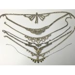 7 vintage paste necklaces.