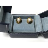 A pair of 9ct gold and cultured pearl clip on earrings in box