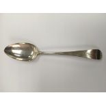 A Georgian silver basting spoon, London hallmarks, maker T.D. Approx 62g.