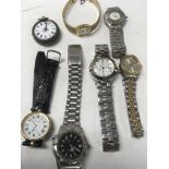 A silver case pocket watch and a collection of dress watches.