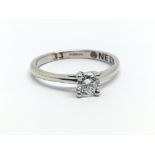 An 18ct white gold single solitaire diamond ring, approx 0.33ct, ring size approx M