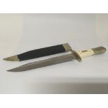 A 1920s Bowie Knife maker FW James Sheffield with an ivory and silver plated grip and original