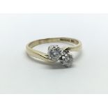 A 9ct yellow gold ring having two diamonds, approx 0.35ct, ring size approx I/J