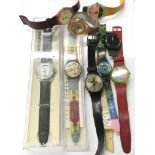 A collection of vintage Swatch watches including
