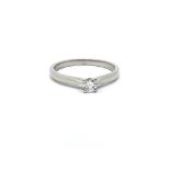 A ladies 18ct white gold solitaire diamond ring, approx 0.20ct, approx size M