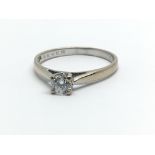 An 18ct white gold and diamond solitaire ring, approx 0.25ct, ring size approx L/M