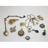 A small collection of costume jewellery including Swarovski heart pendants, lockets etc.