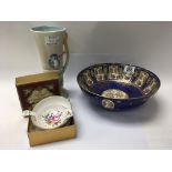 A Royal Doulton gilt decorated fruit bowl, a Clarice Cliff Newport pottery vase, and a boxed crown