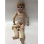 An early German porcelain doll ( marks for B.S.W, Bruno Schmidt Dolls 1898-1930 Germany)
