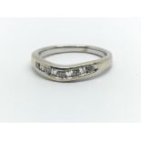 An 18ct white gold and diamond wish bone ring, approx 0.12ct, ring size approx J/K