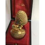 A Stuart Devlin limited edition silver gilt egg ,