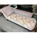 A pink upholstered Victorian chaise lounge. 180 x 70cm