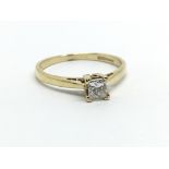 An 18ct yellow gold and princess cut diamond ring, approx 0.25ct, ring size approx L