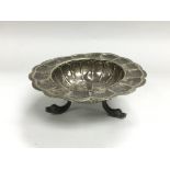 An Ortega white metal scalloped dish, approx width 14cm.