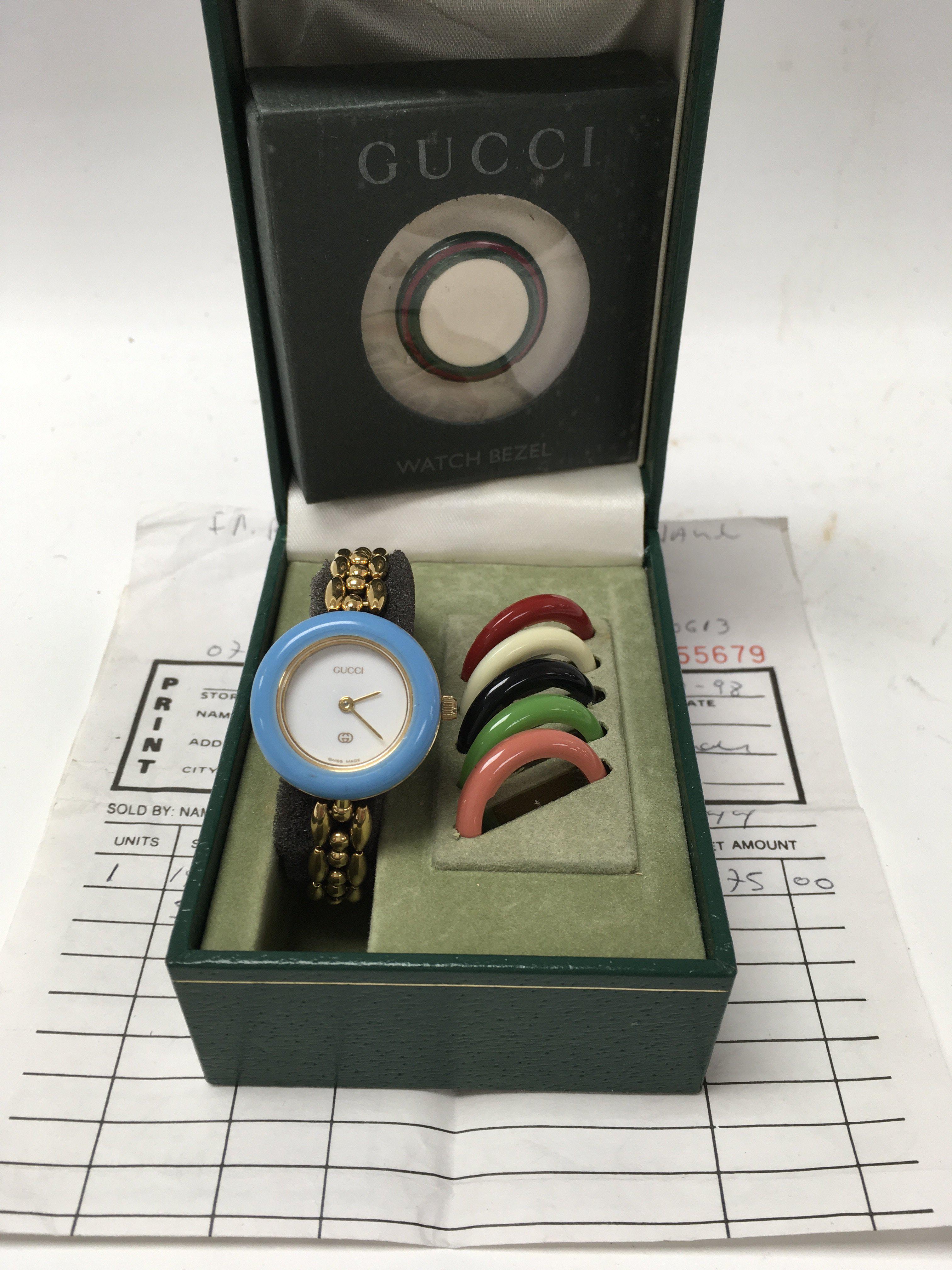 A Gucci ladies multi bezel watch boxed with additional boxed Gucci colours bezel. 11/12, 0647524.